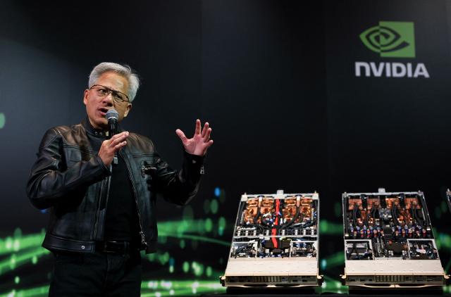 Jensen Huang, co-founder and CEO of Nvidia Corp., speaks during a news conference in Taipei on May 21, 2025. Huang said that US export controls on artificial intelligence chips to China had failed, with companies using locally developed technology. (Photo by I-Hwa Cheng / AFP)