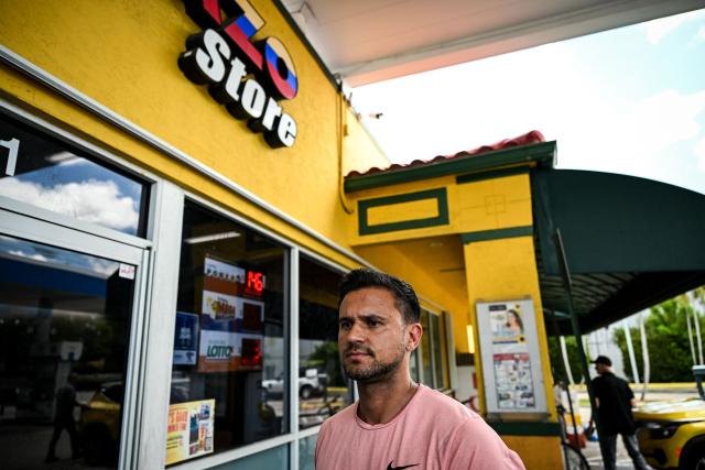 Denis Caldeira looks on as he speaks during an AFP interview outside a Venzuelan food mart in Doral, Florida, May 20, 2025. Denis Caldeira feels in a legal “limbo” since, a few hours ago on May 20, 2025 the US Supreme Court authorized Donald Trump's administration to revoke the immigration status that protected him and nearly 350,000 other Venezuelan migrants. Caldeira, 47, is a beneficiary of Temporary Protected Status (TPS), which covers hundreds of thousands of Venezuelans and was largely granted by former Democratic President Joe Biden, who considered the government of Nicolбs Maduro authoritarian. (Photo by CHANDAN KHANNA / AFP)