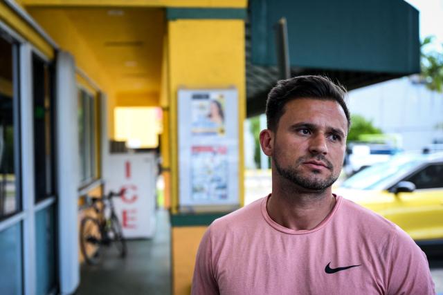 Denis Caldeira looks on as he speaks during an AFP interview outside a Venzuelan food mart in Doral, Florida, May 20, 2025. Denis Caldeira feels in a legal “limbo” since, a few hours ago on May 20, 2025 the US Supreme Court authorized Donald Trump's administration to revoke the immigration status that protected him and nearly 350,000 other Venezuelan migrants. Caldeira, 47, is a beneficiary of Temporary Protected Status (TPS), which covers hundreds of thousands of Venezuelans and was largely granted by former Democratic President Joe Biden, who considered the government of Nicolбs Maduro authoritarian. (Photo by CHANDAN KHANNA / AFP)