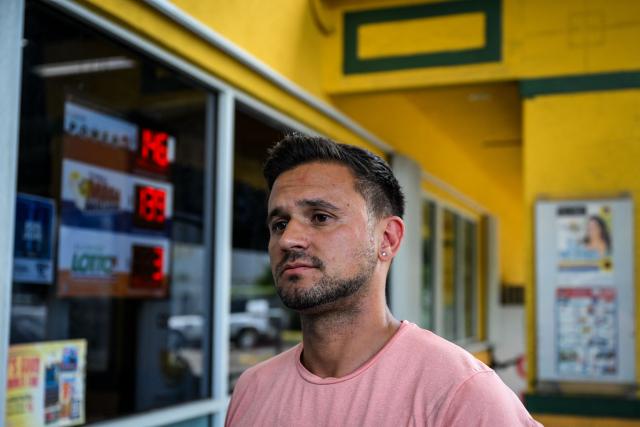 Denis Caldeira looks on as he speaks during an AFP interview outside a Venzuelan food mart in Doral, Florida, May 20, 2025. Denis Caldeira feels in a legal “limbo” since, a few hours ago on May 20, 2025 the US Supreme Court authorized Donald Trump's administration to revoke the immigration status that protected him and nearly 350,000 other Venezuelan migrants. Caldeira, 47, is a beneficiary of Temporary Protected Status (TPS), which covers hundreds of thousands of Venezuelans and was largely granted by former Democratic President Joe Biden, who considered the government of Nicolбs Maduro authoritarian. (Photo by CHANDAN KHANNA / AFP)