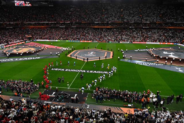 Players make their way on to the pitch prior to the UEFA Europa League final football match between Tottenham Hotspur and Manchester United at the San Mames stadium in Bilbao on May 21, 2025. (Photo by ANDER GILLENEA / AFP)