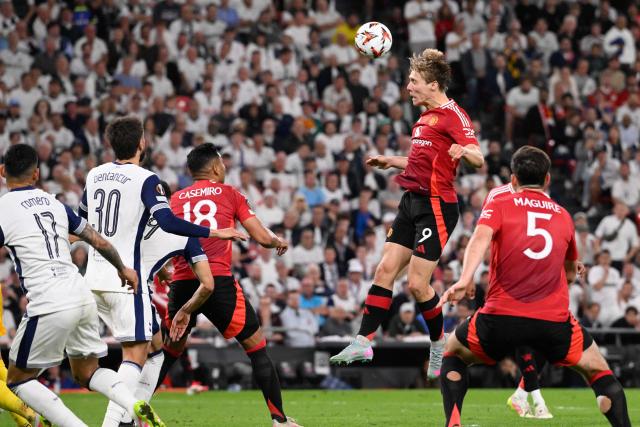 Manchester United's Danish forward #09 Rasmus Hojlund heads the ball during the UEFA Europa League final football match between Tottenham Hotspur and Manchester United at San Mames stadium in Bilbao on May 21, 2025. (Photo by Josep LAGO / AFP)