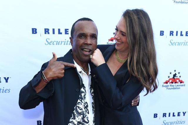 US former professional boxer Sugar Ray Leonard (L) and Claire Khodara arrive for the 14th Annual Sugar Ray Leonard Foundation ‘Big Fighters, Big Cause’ Charity Boxing Night at the The Ritz-Carlton in Marina del Rey, California, on May 21, 2025. (Photo by Unique Nicole / AFP)