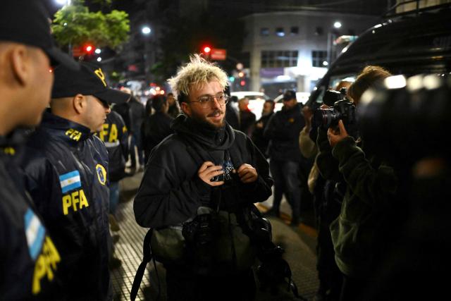 Photojournalist Tomas Cuesta is seen at the time of his release after being arrested during a protest called by retirees against the economic adjustment measures of President Javier Milei's government and demanding an increase in their pensions in front of the National Congress in Buenos Aires on May 21, 2025. An AFP collaborator, photojournalist Tomas Cuesta, was freed in Buenos Aires Monday after he was detained with three other people at a pensioners' march that saw clashes with police. (Photo by Luis ROBAYO / AFP)