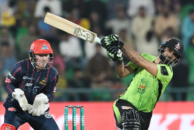 Lahore Qalandars' Fakhar Zaman plays a shot during the Pakistan Super League (PSL) Twenty20 cricket eliminator match between Lahore Qalandars and Karachi Kings at the Qaddafi Cricket Stadium in Lahore on May 22, 2025. (Photo by Aamir QURESHI / AFP)