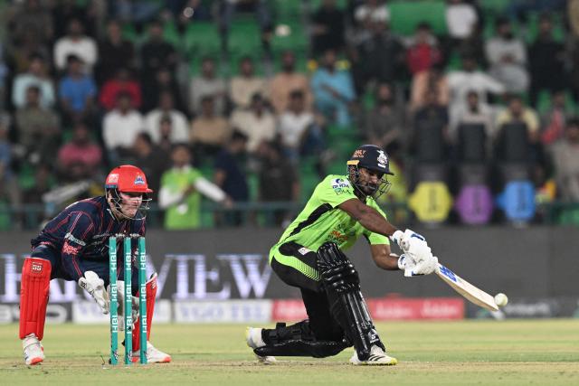 Lahore Qalandars' Kusal Perera plays a shot during the Pakistan Super League (PSL) Twenty20 cricket eliminator match between Lahore Qalandars and Karachi Kings at the Qaddafi Cricket Stadium in Lahore on May 22, 2025. (Photo by Aamir QURESHI / AFP)