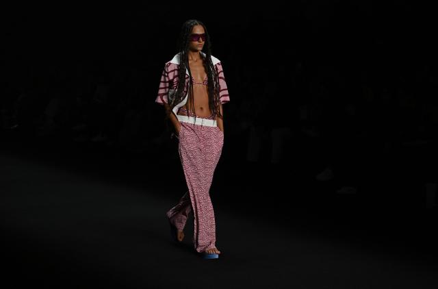 A model presents a creation by Palmacea brand during Bogota Fashion Week in Bogota on May 22, 2025. (Photo by Luis ACOSTA / AFP)