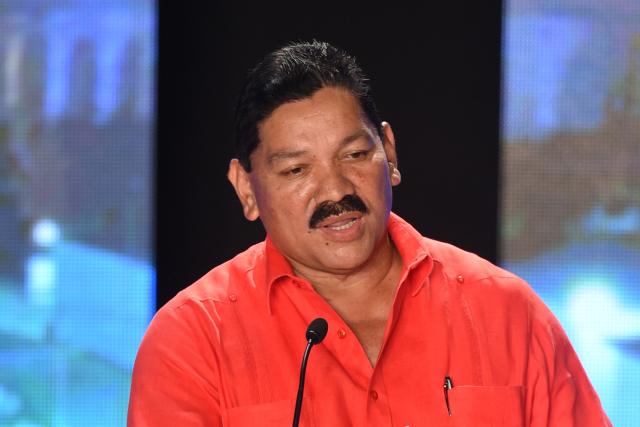 (FILES) Panamanian presidential candidate Genaro Lopez, of the Democratic Board Front (FAD), speaks  during a presidential debate organized by the Panama University in Panama City on April 16, 2014. Historic union leader Genaro Lopez was arrested on May 22, 2025, in Panama, a day after another labor leader requested asylum in the Bolivian embassy, amid protests against President José Raúl Mulino. (Photo by Rodrigo ARANGUA / AFP)