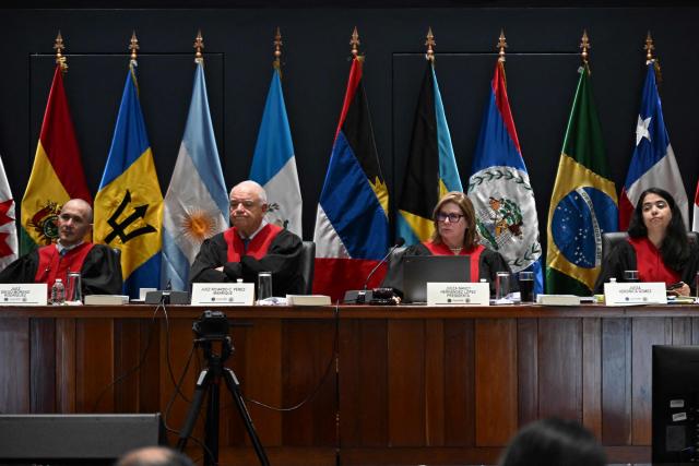 Inter-American Court of Human Rights judges attend a hearing in the case against Peru for the forced sterilization of a woman in 1997, which resulted in her death, in Guatemala City on May 22, 2025. (Photo by JOHAN ORDONEZ / AFP)