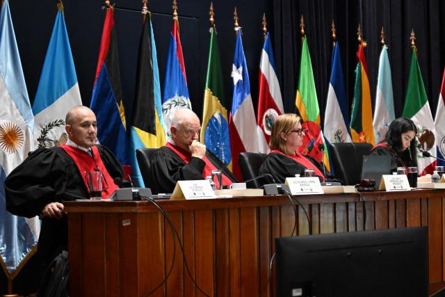 Inter-American Court of Human Rights judges attend a hearing in the case against Peru for the forced sterilization of a woman in 1997, which resulted in her death, in Guatemala City on May 22, 2025. (Photo by JOHAN ORDONEZ / AFP)