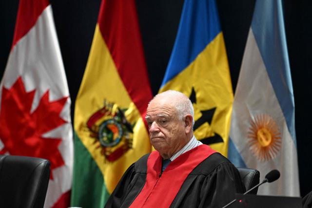 Uruguayan Judge Ricardo Perez of the Inter-American Court of Human Rights attends a hearing in the case against Peru for the forced sterilization of a woman in 1997, which resulted in her death, in Guatemala City on May 22, 2025. (Photo by JOHAN ORDONEZ / AFP)