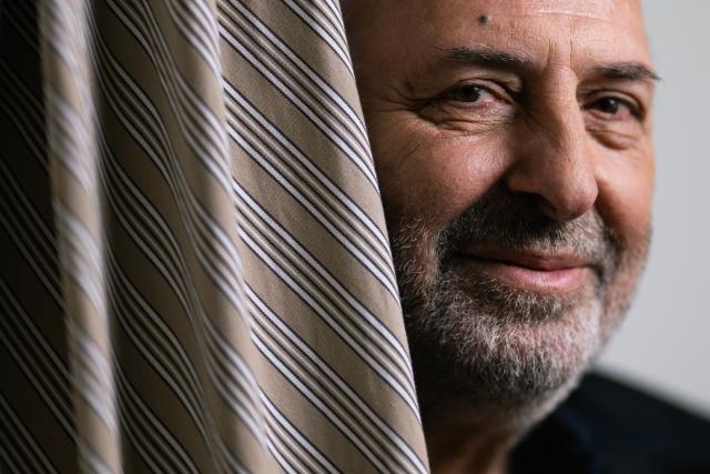 French director Cedric Klapisch poses during a photo session at the 78th edition of the Cannes Film Festival in Cannes, southern France, on May 22, 2025. (Photo by Julie SEBADELHA / AFP)