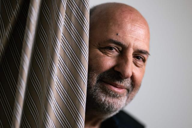 French director Cedric Klapisch poses during a photo session at the 78th edition of the Cannes Film Festival in Cannes, southern France, on May 22, 2025. (Photo by Julie SEBADELHA / AFP)