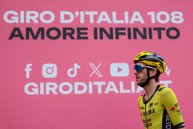 Team Visma-Lease a Bike's British rider Simon Yates waits before the start of the 14th stage of the 108th Giro d'Italia cycling race of 195kms from Treviso in Italy to Nova Gorica in Slovenia on May 24, 2025. (Photo by Luca Bettini / AFP)
