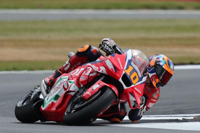 Honda HRC Castrol team's  Italian MotoGP rider Luca Marini takes part in a practice session of the MotoGP British Grand Prix at Silverstone circuit in Northamptonshire, central England, on May 24, 2025. (Photo by Adrian Dennis / AFP)