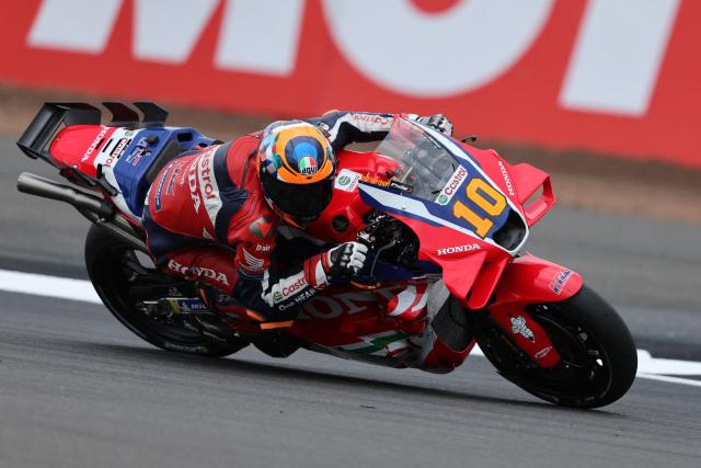 Honda HRC Castrol team's  Italian MotoGP rider Luca Marini takes part in a practice session of the MotoGP British Grand Prix at Silverstone circuit in Northamptonshire, central England, on May 24, 2025. (Photo by Adrian Dennis / AFP)