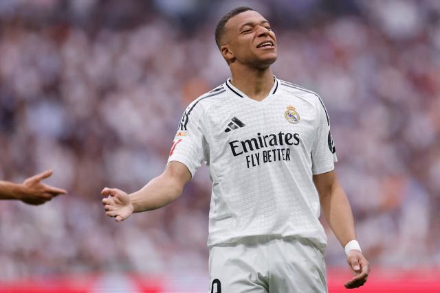 Real Madrid's French forward #09 Kylian Mbappe reacts during the Spanish league football match between Real Madrid CF and Real Sociedad at Santiago Bernabeu Stadium in Madrid on May 24, 2025. (Photo by OSCAR DEL POZO / AFP)