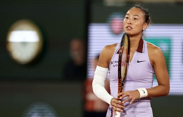 China's Zheng Qinwen reacts during her women's singles match against Russia’s Anastasia Pavlyuchenkova on day 1 of the French Open tennis tournament on Court Philippe-Chatrier at the Roland-Garros Complex in Paris on May 25, 2025. (Photo by Alain JOCARD / AFP)
