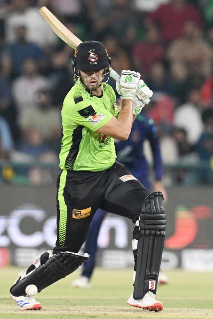 Lahore Qalandars' Mohammad Naeem plays a shot during the Pakistan Super League (PSL) Twenty20 final cricket match between Lahore Qalandars and Quetta Gladiators at the Qaddafi Cricket Stadium in Lahore on May 25, 2025. (Photo by Aamir QURESHI / AFP)