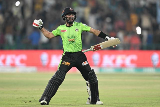 Lahore Qalanders' Sikandar Raza celebrates after playing the winning shot at the end of the Pakistan  Super League (PSL) Twenty20 final cricket match between Lahore Qalandars and Quetta Gladiators at the Gaddafi Stadium in Lahore on May 25, 2025. (Photo by Aamir QURESHI / AFP)