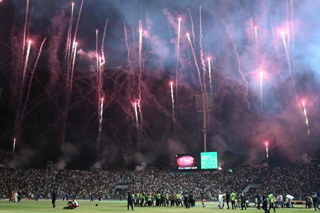 Lahore Qalanders' players celebrate their victory at the end of the Pakistan Super League (PSL) Twenty20 final cricket match between Lahore Qalandars and Quetta Gladiators at the Gaddafi Stadium in Lahore on May 25, 2025. (Photo by Aamir QURESHI / AFP)