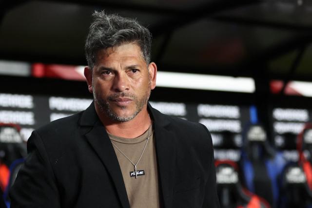 Platense's coach Segio Gomez looks on after winning the Argentine Professional Football League 2025 Apertura Tournament semi-final match between San Lorenzo and Platense at the Pedro Bidegain stadium in Buenos Aires on May 25, 2025. (Photo by ALEJANDRO PAGNI / AFP)