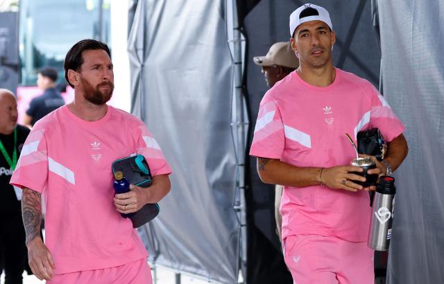 (FILES) Inter Miami's Argentine forward #10 Lionel Messi (L) and Inter Miami's Uruguayan forward #09 Luis Suarez arrive for the MLS football match between Inter Miami FC and the New York Red Bulls, at Chase Stadium in Fort Lauderdale, Florida on May 3, 2025. Suarez announced on May 27, 2025 Suarez that he has added Lionel Messi to his project in Uruguay: a sports club specialising in player training that will compete at youth level and in the fourth division of local football. (Photo by Chris Arjoon / AFP)