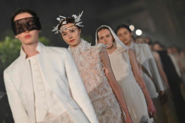 Models walk the runway during the Dior Women Cruise 26 fashion collection show at Villa Albani Torlonia, in Rome on May 27, 2025. (Photo by Andreas SOLARO / AFP)