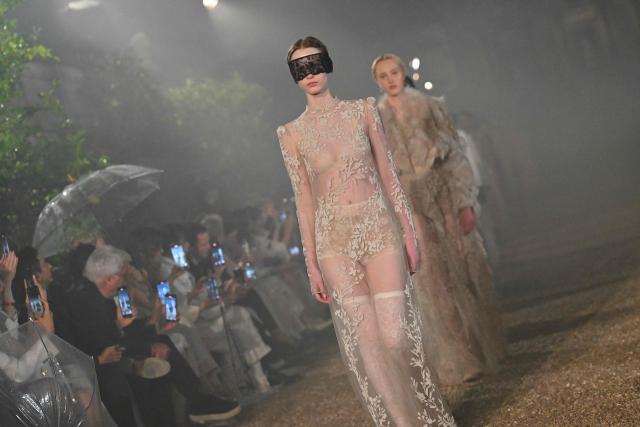 Models walk the runway during the Dior Women Cruise 26 fashion collection show at Villa Albani Torlonia, in Rome on May 27, 2025. (Photo by Andreas SOLARO / AFP)
