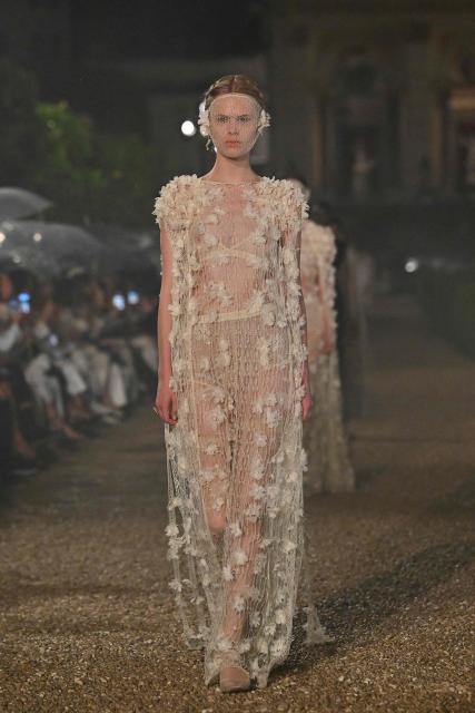 A model presents a creation during the Dior Women Cruise 26 fashion collection show at Villa Albani Torlonia, in Rome, on May 27, 2025. (Photo by Andreas SOLARO / AFP)