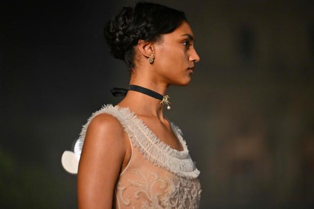 A model presents a creation during the Dior Women Cruise 26 fashion collection show at Villa Albani Torlonia, in Rome, on May 27, 2025. (Photo by Andreas SOLARO / AFP)