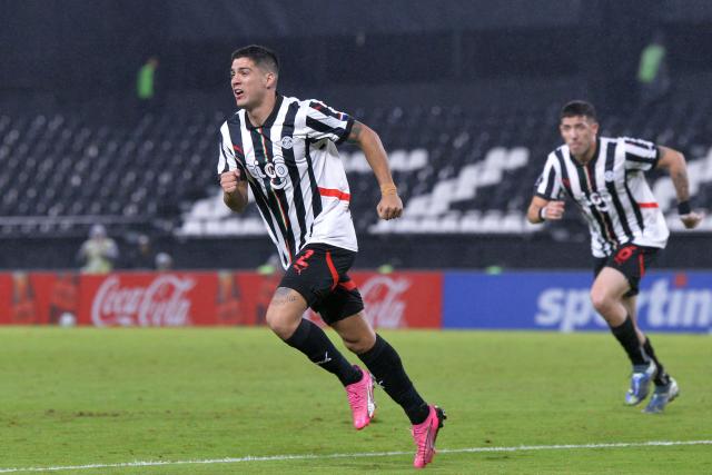 Libertad's defender #02 Ivan Ramirez celebrates scoring his team's second goal during the Copa Libertadores group stage football match between Paraguay's Libertad and Peru's Alianza Lima at La Huerta stadium in Asuncion on May 27, 2025. (Photo by DANIEL DUARTE / AFP)