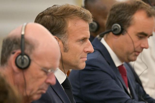 France's President Emmanuel Macron (C) attends a meeting with Indonesia's President Prabowo Subianto at Merdeka Palace in Jakarta on May 28, 2025. (Photo by BAY ISMOYO / AFP)