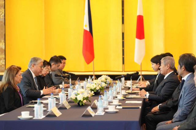 Philippine Foreign Minister Enrique Manalo (2nd L) meets with his Japanese counterpart Takeshi Iwaya (2nd R) during the Japan-Philippines foreign ministers’ meeting at the Iikura guest house in Tokyo on May 28, 2025. (Photo by Kazuhiro NOGI / AFP)