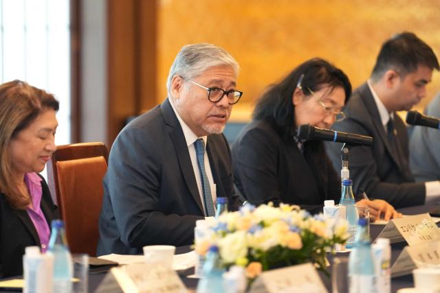 Philippine Foreign Minister Enrique Manalo (2nd L) attends the Japan-Philippines foreign ministers’ meeting with his Japanese counterpart Takeshi Iwaya (not pictured) at the Iikura guest house in Tokyo on May 28, 2025. (Photo by Kazuhiro NOGI / AFP)