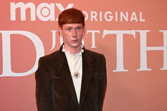 French model Pierre Painchaud poses for pictures during a photocall for a preview of the TV serie "And Just Like That..." at the Lido theatre in Paris, on May 28, 2025. (Photo by Hugo MATHY / AFP)