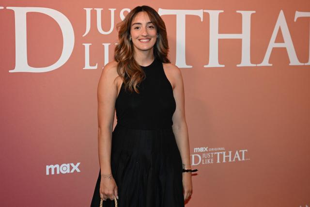 French-Morrocan influencer Kenza Sadoun El Glaoui poses for pictures during a photocall for a preview of the TV serie "And Just Like That..." at the Lido theatre in Paris, on May 28, 2025. (Photo by Hugo MATHY / AFP)