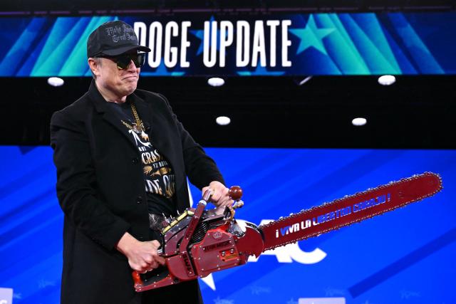 (FILES) Elon Musk holds a chainsaw reading "Long live freedom, damn it" during the annual Conservative Political Action Conference (CPAC) at the Gaylord National Resort & Convention Center at National Harbor in Oxon Hill, Maryland, on February 20, 2025. Billionaire Elon Musk on May 28, 2025 said he was leaving his position within the US government after leading the so-called Department of Government Efficiency in a controversial effort to slash federal spending. "As my scheduled time as a Special Government Employee comes to an end, I would like to thank President Donald Trump for the opportunity to reduce wasteful spending," he wrote on his social media platform X. (Photo by SAUL LOEB / AFP)