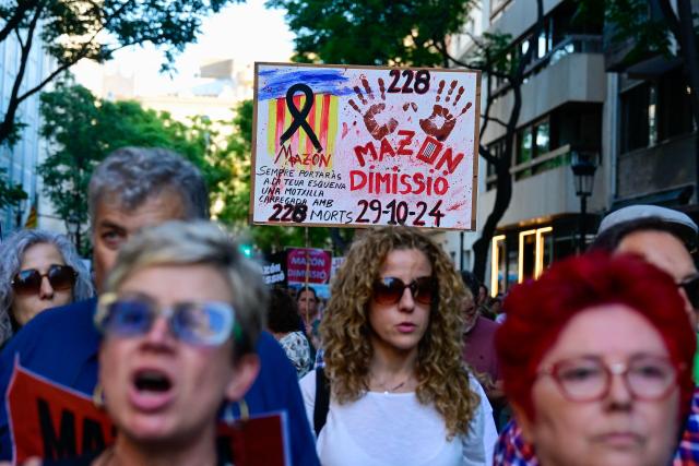 People attend a demonstration to protest the regional government's response and call for the resignation of Valencia regional president Carlos Mazon, seven months after devastating floods in Valencia, eastern Spain, on May 29, 2025. Protesters gathered in the Spanish city of Valencia today in the latest protest demanding the regional leader's resignation for his handling of last year's catastrophic floods.  The regional leader has weathered fierce scrutiny since the October 29 catastrophe that killed 232 people in the country's deadliest floods in decades, including 224 in the eastern Valencia region. (Photo by JOSE JORDAN / AFP)