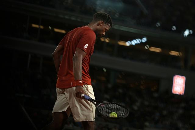 France's Gael Monfils reacts during his men's singles match against Britain's Jack Draper on day 5 of the French Open tennis tournament on Court Philippe-Chatrier at the Roland-Garros Complex in Paris on May 29, 2025. (Photo by ALAIN JOCARD / AFP)
