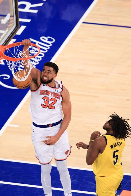 Knicks' center #32 Karl-Anthony Towns reacts after a dunk during Game Five of the Eastern Conference Finals of the 2025 NBA Playoffs between the New York Knicks and the Indiana Pacers at Madison Square Garden in New York on May 29, 2025. (Photo by CHARLY TRIBALLEAU / AFP)