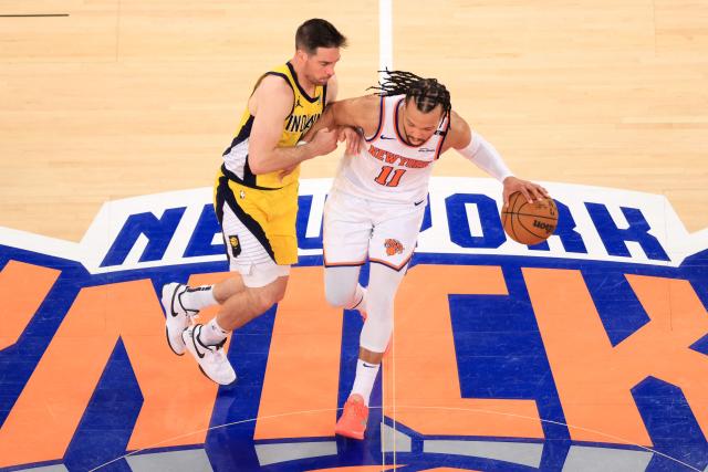 Knicks' point guard #11 Jalen Brunson (R) dribbles the ball under pressure from the Pacers' point guard #09 TJ McConnell (L) during Game Five of the Eastern Conference Finals of the 2025 NBA Playoffs between the New York Knicks and the Indiana Pacers at Madison Square Garden in New York on May 29, 2025. (Photo by CHARLY TRIBALLEAU / AFP)
