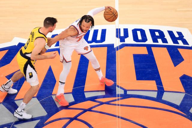 Knicks' point guard #11 Jalen Brunson (R) dribbles the ball under pressure from the Pacers' point guard #09 TJ McConnell (L) during Game Five of the Eastern Conference Finals of the 2025 NBA Playoffs between the New York Knicks and the Indiana Pacers at Madison Square Garden in New York on May 29, 2025. (Photo by CHARLY TRIBALLEAU / AFP)
