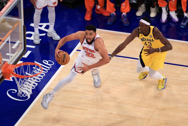Knicks' center #32 Karl-Anthony Towns drives to the basket past Pacers' center #43 Pascal Siakam during Game Five of the Eastern Conference Finals of the 2025 NBA Playoffs between the New York Knicks and the Indiana Pacers at Madison Square Garden in New York on May 29, 2025. (Photo by CHARLY TRIBALLEAU / AFP)