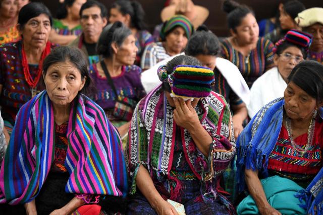 EDITORS NOTE: Graphic content / Guatemalan Achi women, victims of rape during the civil war, react at the end of the trial against three former paramilitaries who were sentenced to 40 years in prison for crimes of sexual violence against six Mayan women from the Achi community of Rabinal during the civil war in Guatemala (1960-1996), at the Palace of Justice in Guatemala City on May 30, 2025. The three former paramilitaries, also indigenous, were members of the Civil Self-Defense Patrols, created by the Armed Forces to fight the leftist guerrillas during the war that left 200,000 dead and missing, according to the UN. (Photo by JOHAN ORDONEZ / AFP)