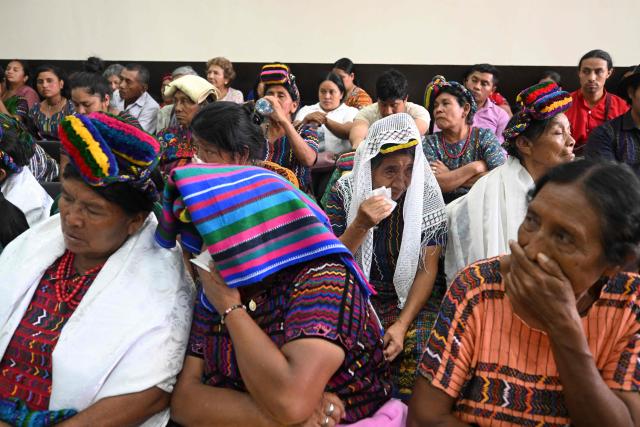 EDITORS NOTE: Graphic content / Guatemalan Achi women -victims of rape during the civil war- react at the end of the trial against three former paramilitaries, who were sentenced to 40 years in prison for crimes of sexual violence against six Mayan women from the Achi community of Rabinal during the civil war in Guatemala (1960-1996), at the Palace of Justice in Guatemala City on May 30, 2025. The three former paramilitaries, also indigenous, were members of the Civil Self-Defense Patrols, created by the Armed Forces to fight the leftist guerrillas during the war that left 200,000 dead and missing, according to the UN. (Photo by JOHAN ORDONEZ / AFP)