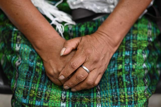 EDITORS NOTE: Graphic content / A Guatemalan Achi woman -victim of rape during the civil war- reacts at the end of the trial against three former paramilitaries, who were sentenced to 40 years in prison for crimes of sexual violence against six Mayan women from the Achi community of Rabinal during the civil war in Guatemala (1960-1996), at the Palace of Justice in Guatemala City on May 30, 2025. The three former paramilitaries, also indigenous, were members of the Civil Self-Defense Patrols, created by the Armed Forces to fight the leftist guerrillas during the war that left 200,000 dead and missing, according to the UN. (Photo by JOHAN ORDONEZ / AFP)