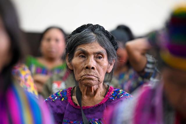EDITORS NOTE: Graphic content / Guatemalan Achi women -victims of rape during the civil war- react at the end of the trial against three former paramilitaries, who were sentenced to 40 years in prison for crimes of sexual violence against six Mayan women from the Achi community of Rabinal during the civil war in Guatemala (1960-1996), at the Palace of Justice in Guatemala City on May 30, 2025. The three former paramilitaries, also indigenous, were members of the Civil Self-Defense Patrols, created by the Armed Forces to fight the leftist guerrillas during the war that left 200,000 dead and missing, according to the UN. (Photo by JOHAN ORDONEZ / AFP)