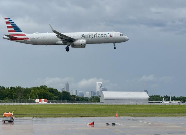A American Airlines plane lands at Washington Reagan National Airport in Arlington, Virginia, on May 30, 2025. (Photo by Daniel SLIM / AFP)