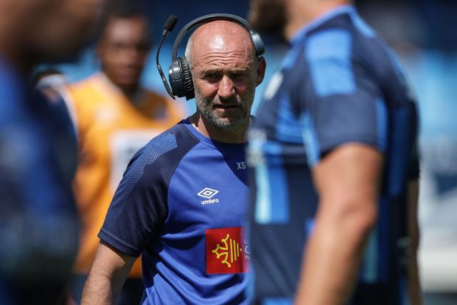 Castres' French coach Xavier Sadourny looks on prior to the French Top 14 rugby union match between Castres Olympique and Aviron Bayonnais (Bayonne) at the Stade Pierre-Fabre in Castres, southern France on May 31, 2025. (Photo by Valentine CHAPUIS / AFP)